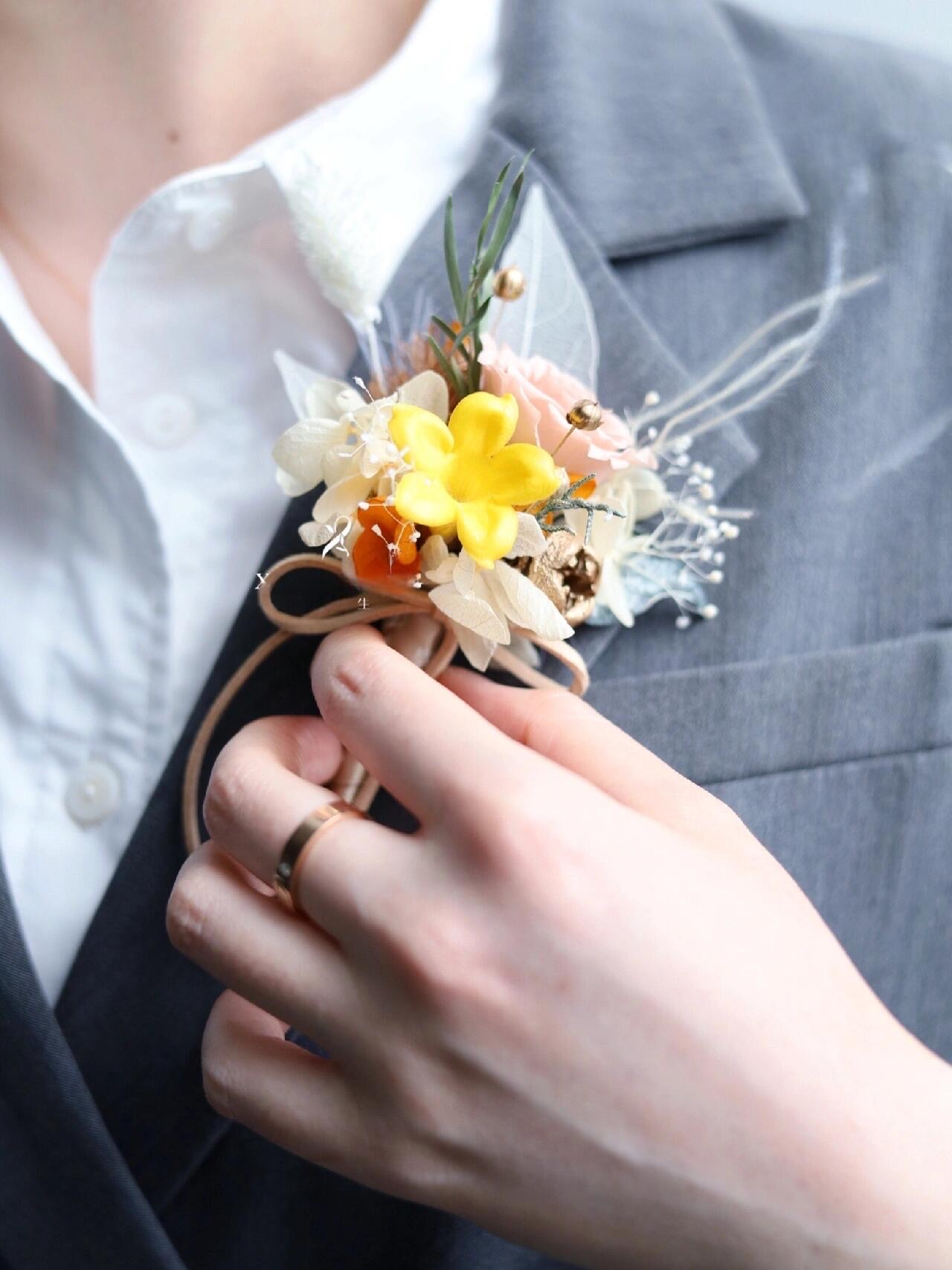 Boutonniere With Soft Blush & Yellow Blooms