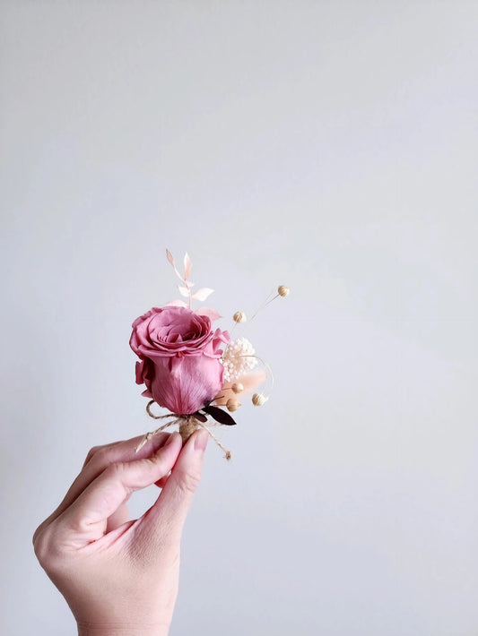 Boutonniere With Dark Mauve Rose