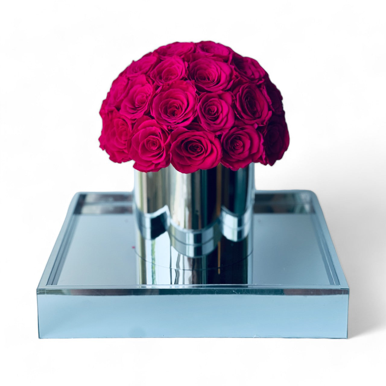 The Preserved Yellow Rose Arrangement showcases expertly preserved roses with a soft, vibrant hot pink hue and petal-perfect texture. This timeless eternity rose gift adds everlasting elegance to any space, making it perfect for special occasions like Valentine's Day or anniversaries.