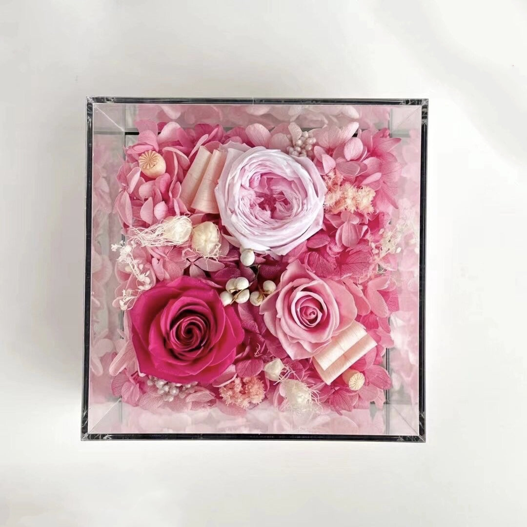 The 5 Rose Mini Floral Box features three preserved roses beautifully arranged in a compact box. A perfect eternity rose gift for making a thoughtful and elegant gesture on any special occasion.