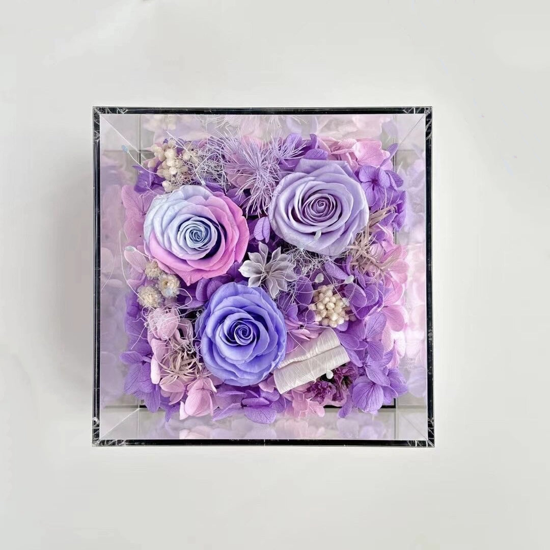 The 7 Rose Mini Floral Box features three preserved roses beautifully arranged in a compact box. A perfect eternity rose gift for making a thoughtful and elegant gesture on any special occasion.