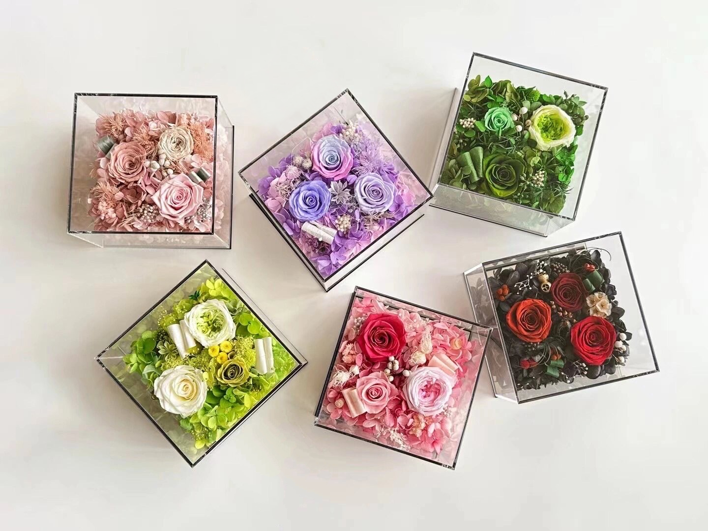 The 4 Rose Mini Floral Box features three preserved roses beautifully arranged in a compact box. A perfect eternity rose gift for making a thoughtful and elegant gesture on any special occasion.