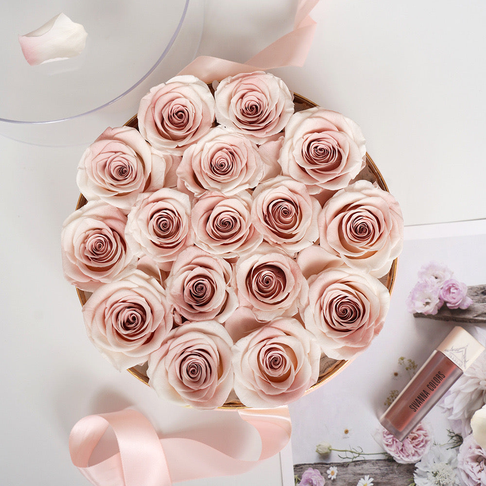 Stunning floral box featuring 16 long-stemmed preserved roses, available in multiple colors, elegantly arranged in a round box. A perfect eternity rose gift for birthdays, anniversaries, or Valentine's Day.