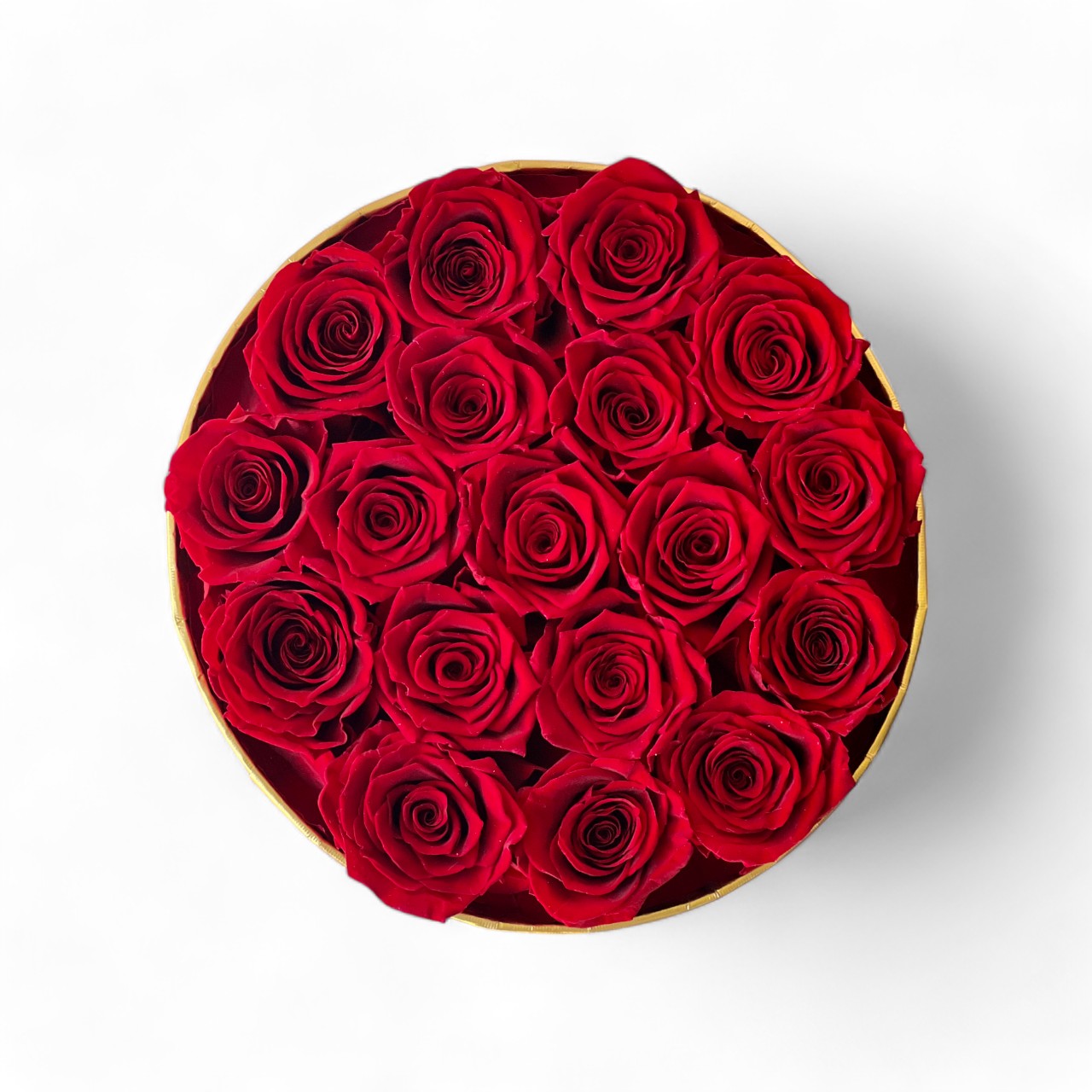 Luxurious Preserved Red Roses Hat Box featuring vibrant preserved red roses in a gold and black container. A timeless expression of love, perfect for gifting or adding elegance to any space.