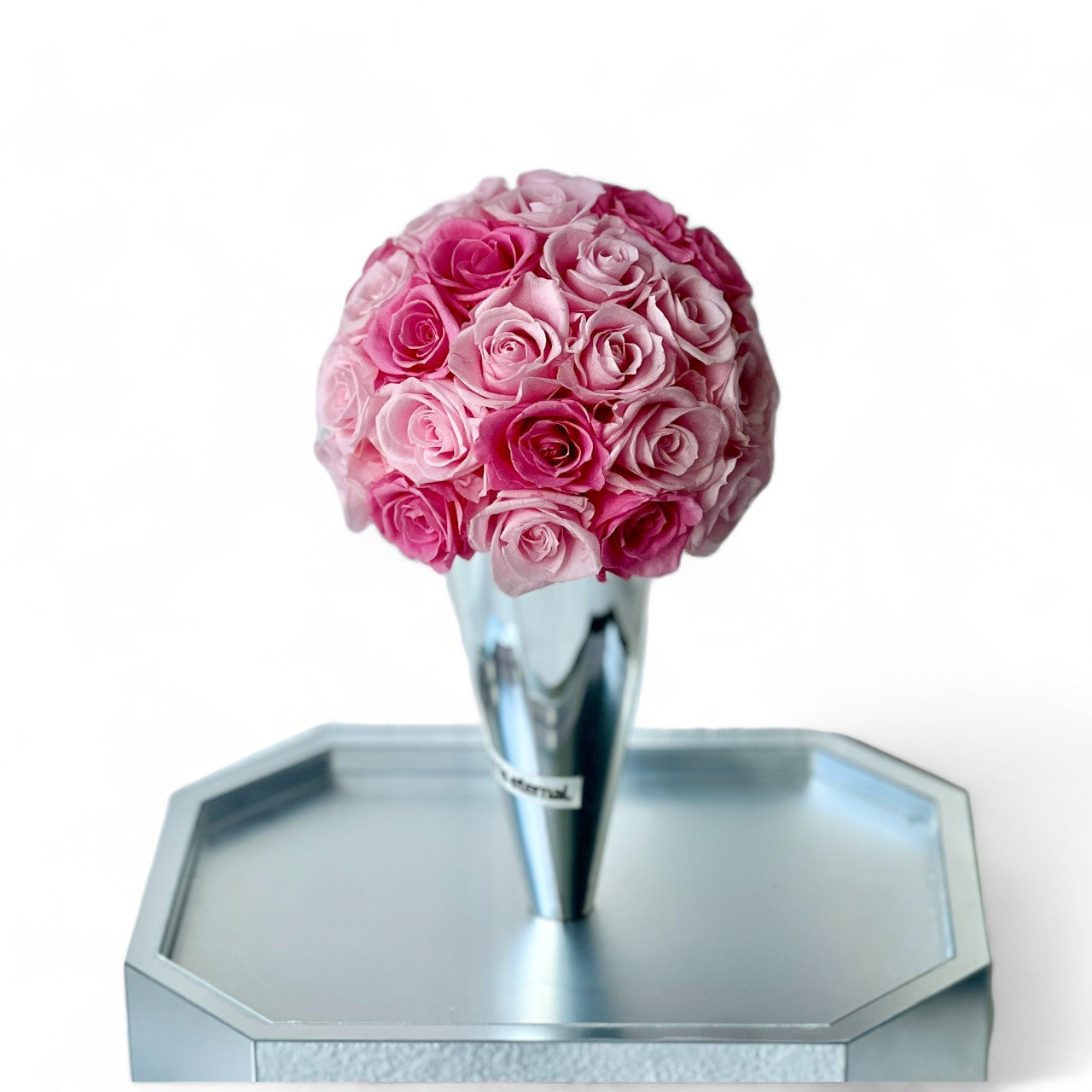 The Preserved Pink Rose Ice Cream Cone features vibrant pink roses arranged like a scoop of strawberry ice cream. A whimsical eternity rose gift perfect for bringing joy to any space or occasion.