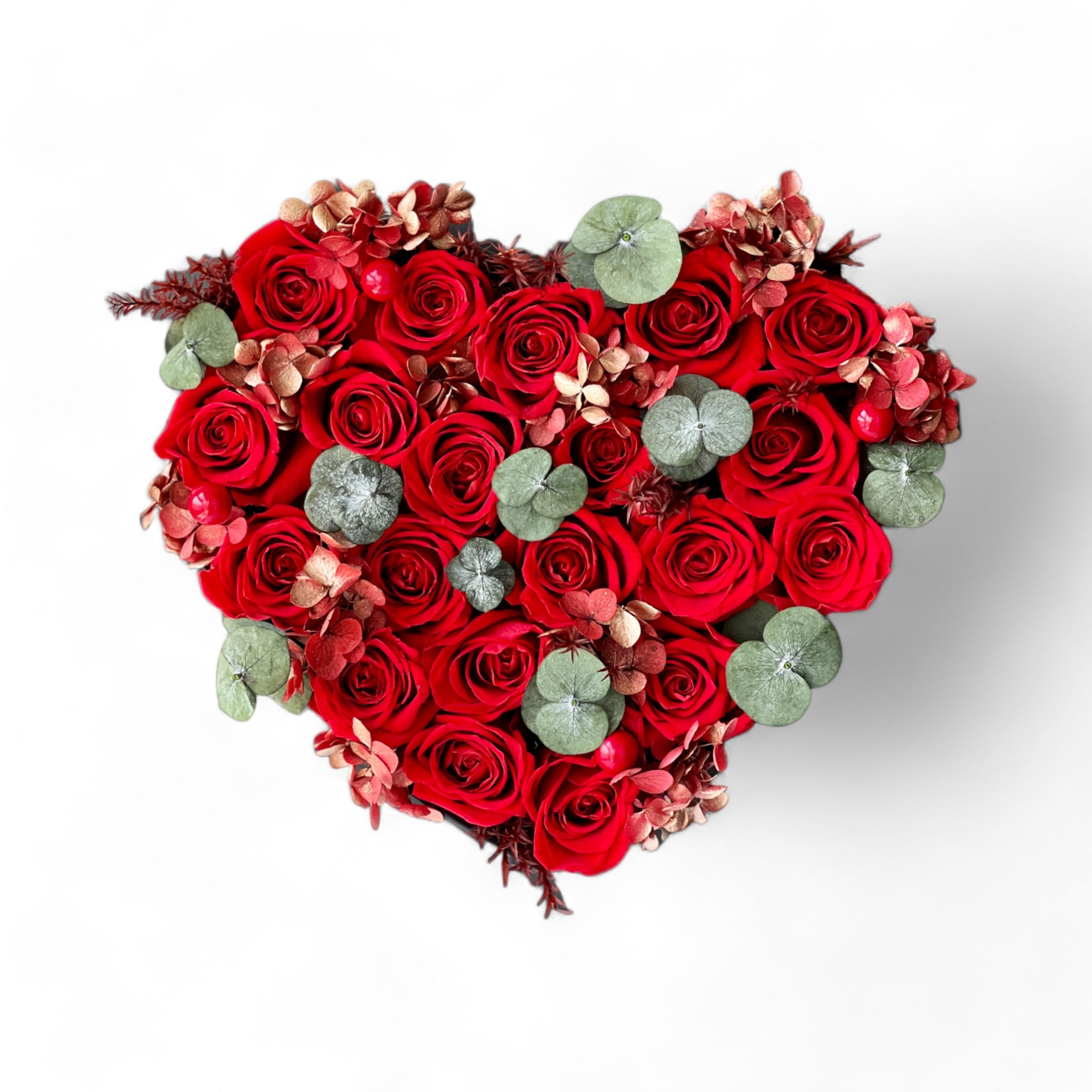 Heartfelt Rose Creation featuring preserved roses arranged in a heart shape, radiating love and affection. Ideal for special occasions like Valentine's Day or anniversaries, offering timeless elegance and deep sentiment.