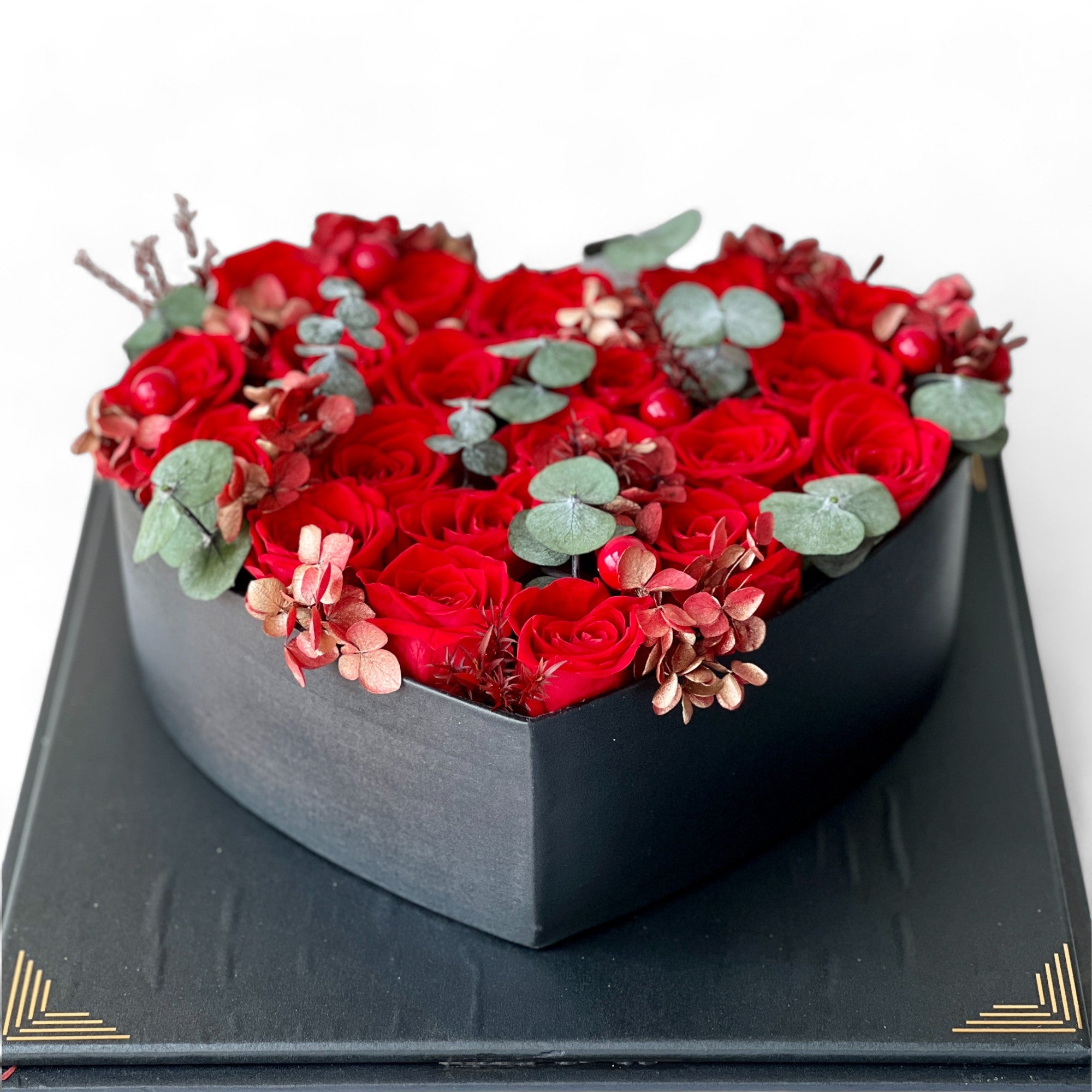 Heartfelt Rose Creation featuring preserved roses arranged in a heart shape, radiating love and affection. Ideal for special occasions like Valentine's Day or anniversaries, offering timeless elegance and deep sentiment.