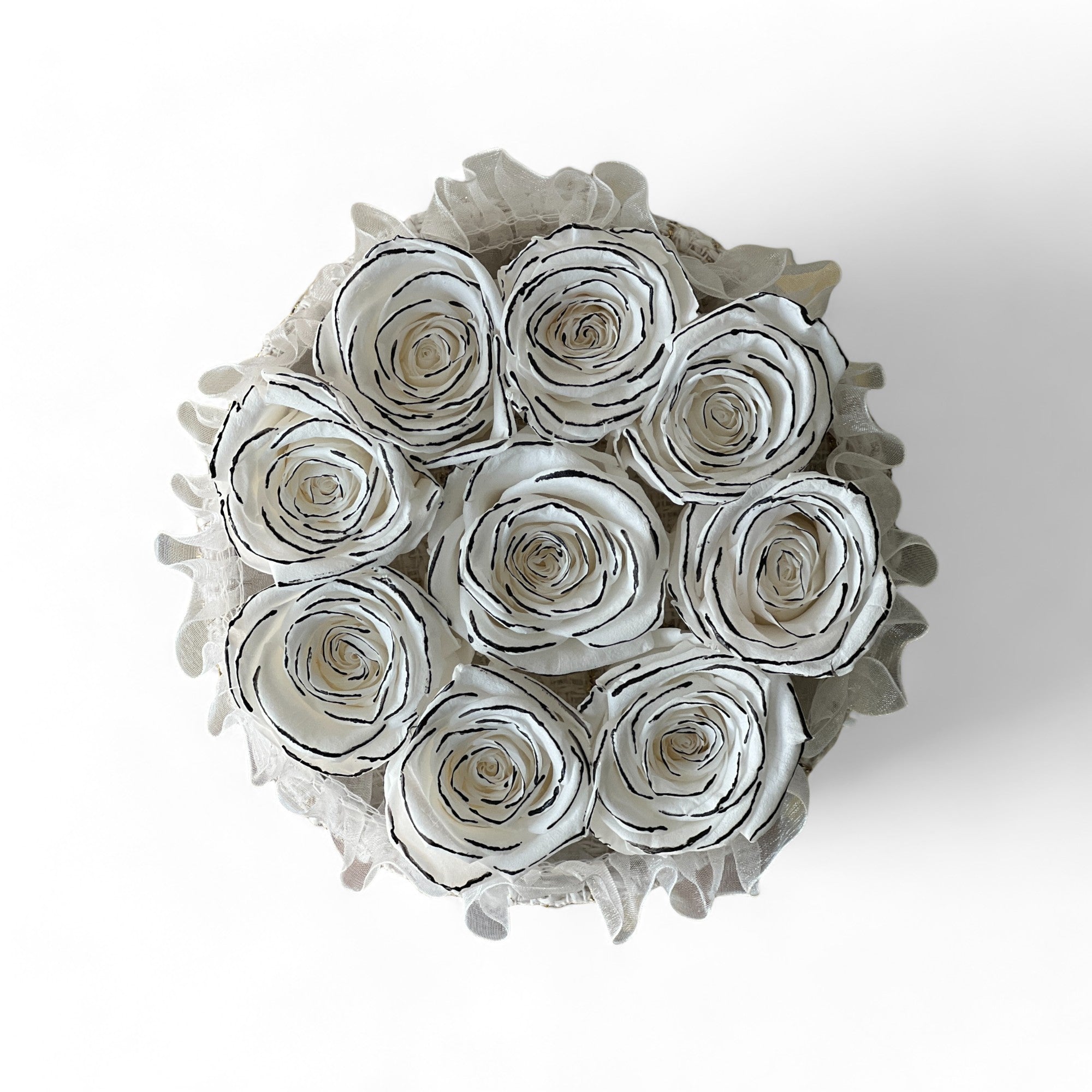 Signature Rose Basket featuring 13 preserved white roses elegantly arranged in a classic woven basket. A luxurious eternity rose gift perfect for adding grace to any space or gifting on special occasions.