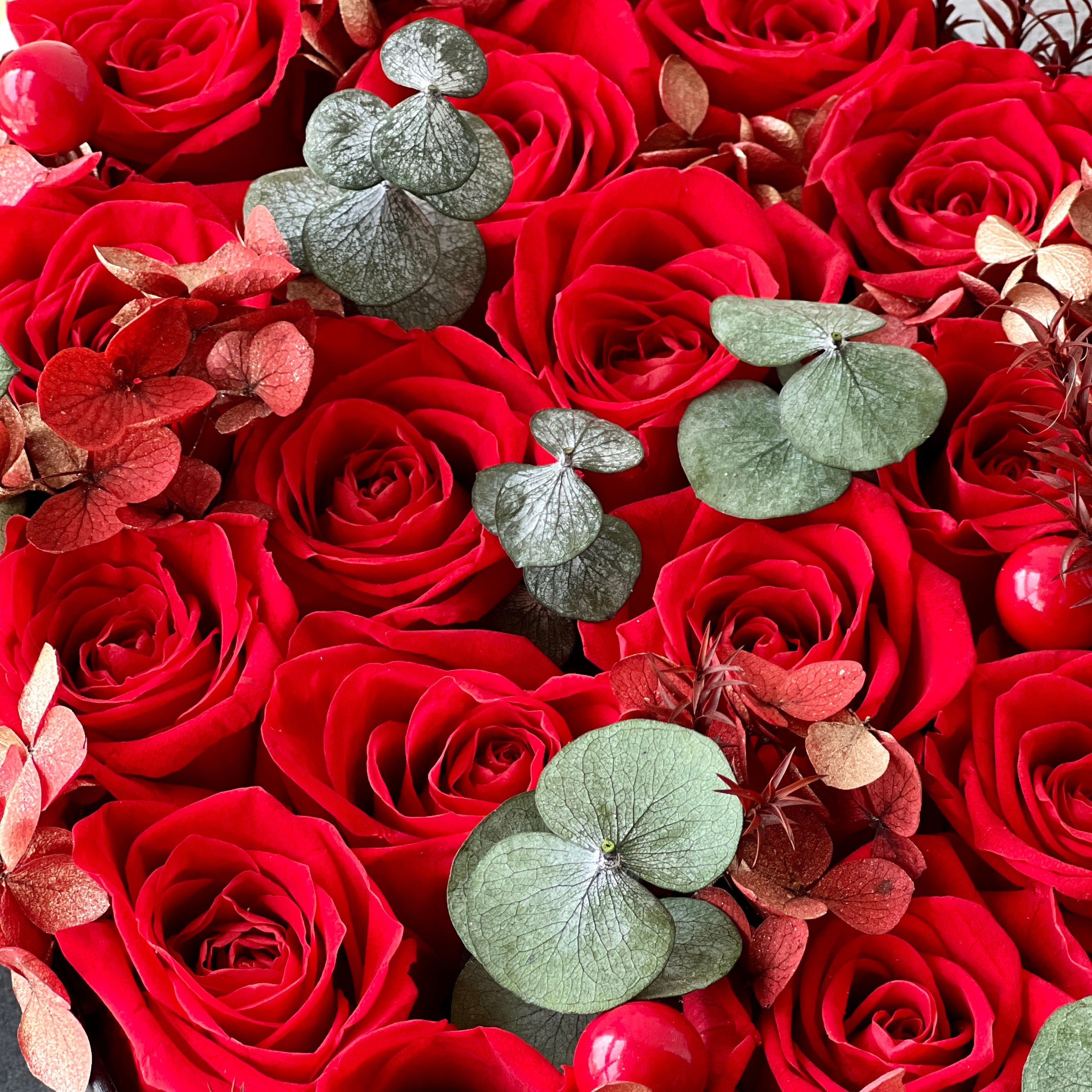 Heartfelt Rose Creation featuring preserved roses arranged in a heart shape, radiating love and affection. Ideal for special occasions like Valentine's Day or anniversaries, offering timeless elegance and deep sentiment.