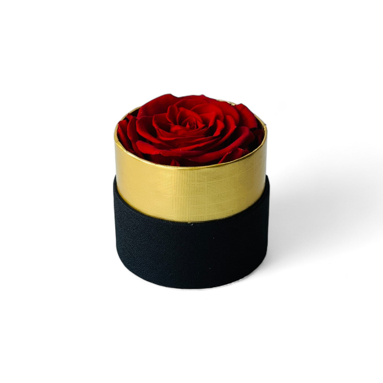 The Solitaire Red Rose Mini Hatbox features a single preserved red rose encased in a matte black box, symbolizing timeless love and devotion. This elegant eternity rose gift requires no care, offering lasting beauty for any special occasion.