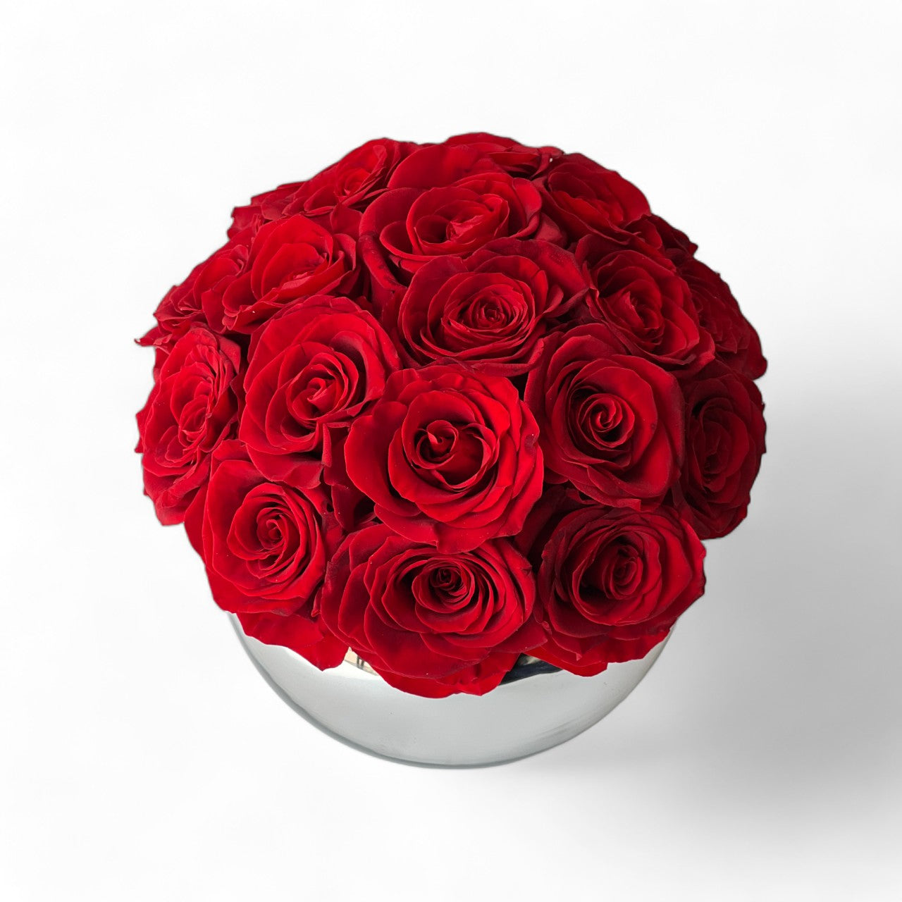 Preserved Red Rose Arrangement—vivid red blooms, perfectly preserved for lasting beauty. Ideal for adding a romantic touch to any space or as a thoughtful gift.