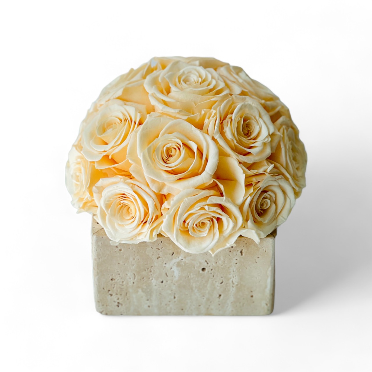 Golden Glow features creamy yellow preserved roses in a rustic concrete pot, offering enduring beauty without maintenance—a perfect gift or décor piece.