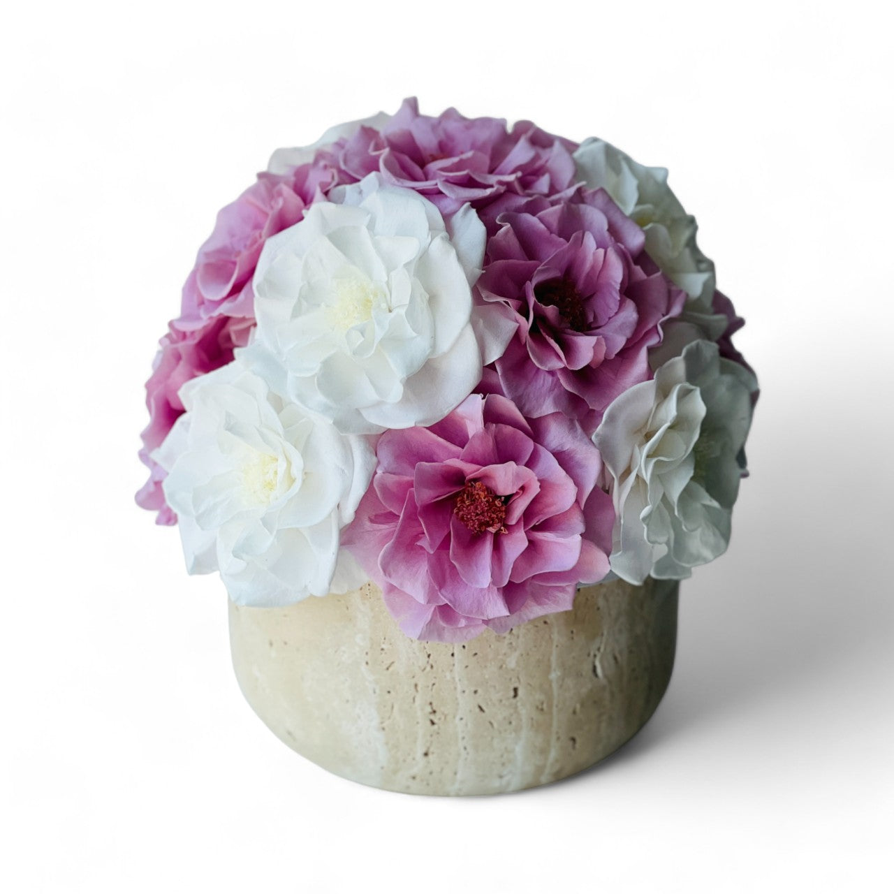 A charming dome of preserved white and purple roses, set in a stylish concrete vase, offers lasting elegance and sophistication without maintenance.