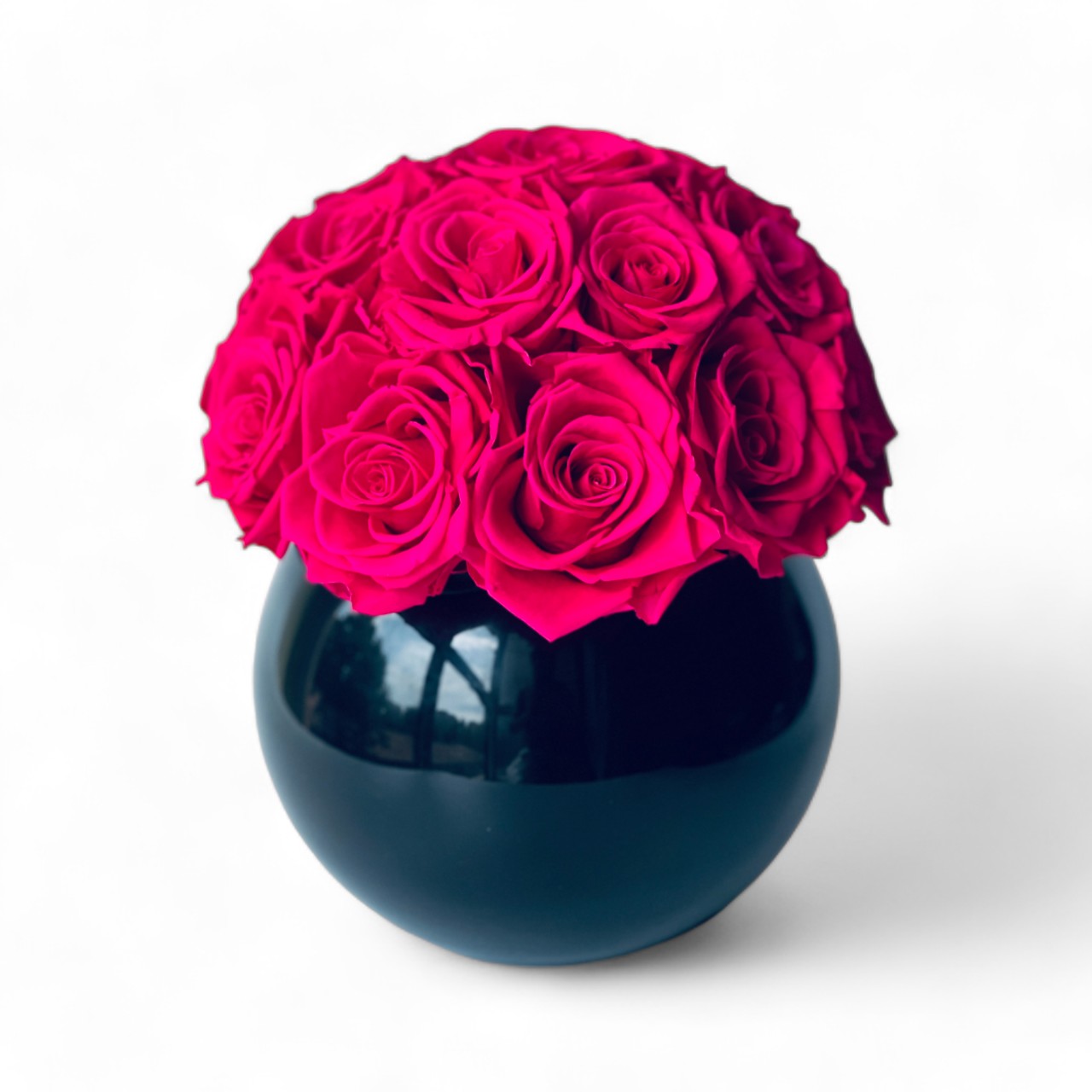 Hot Pink Roses in Black Vase: A bold sphere of preserved roses in a glossy black vase, offering a striking, maintenance-free touch of sophistication for any space.