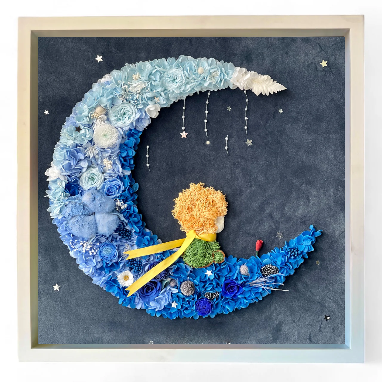 The Little Prince Le Petit Prince preserved floral artwork featuring roses and hydrangeas, capturing the iconic moonlit scene. A perfect tribute to imagination and adventure.