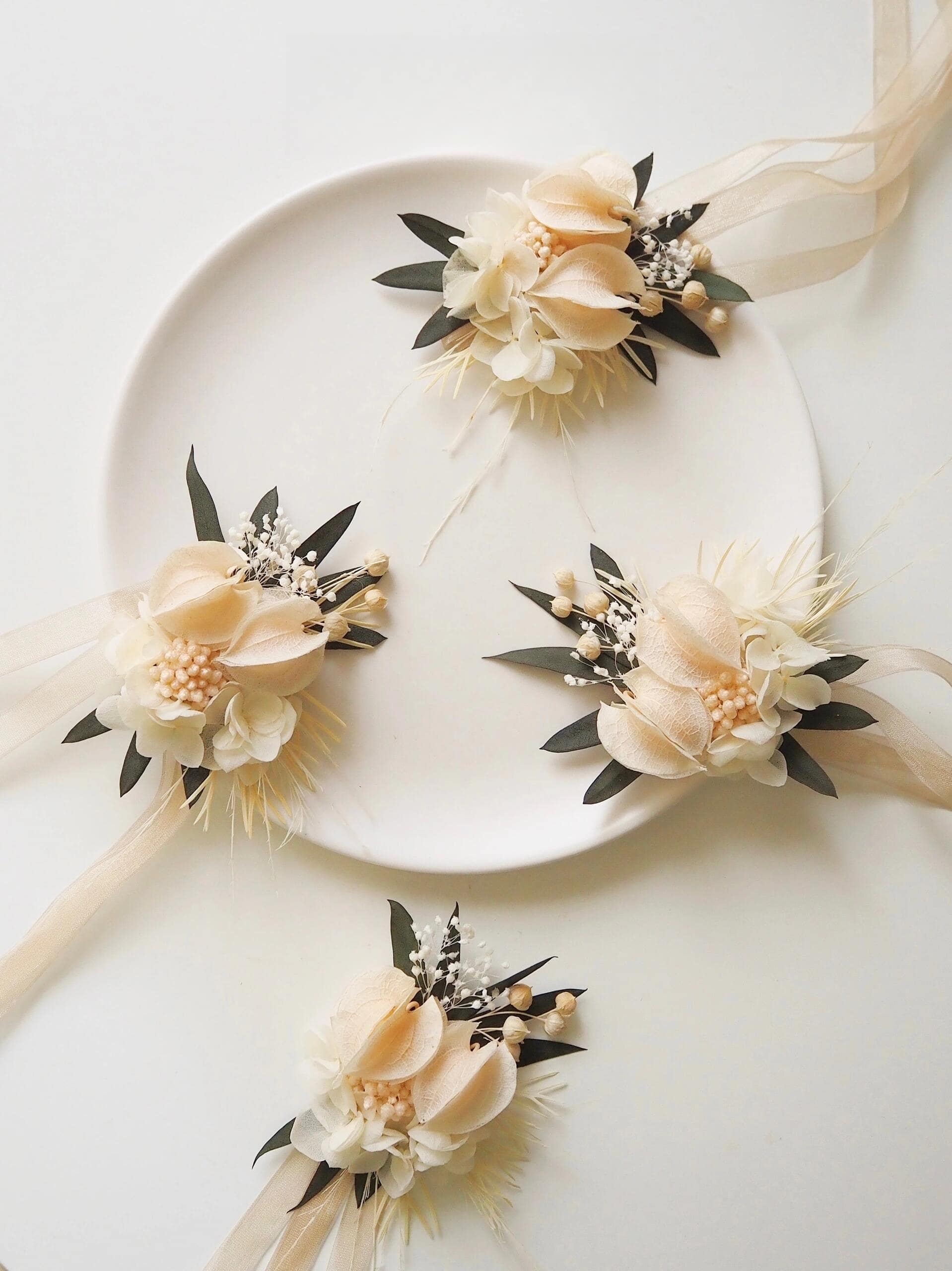 Elegant preserved ivory calla lily corsage with hydrangea accents
