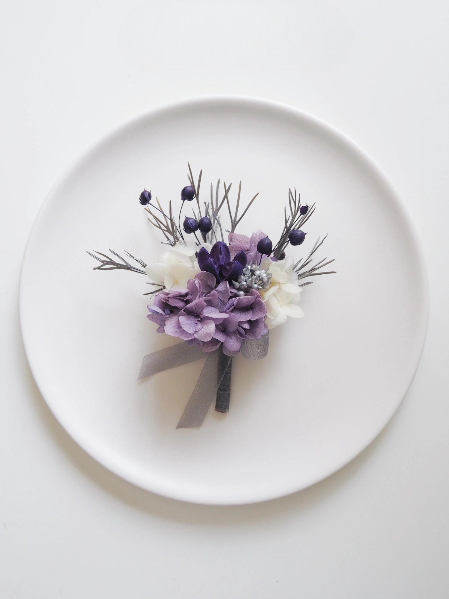 Lavender and White Hydrangea Boutonniere with Elegant Berry Accents