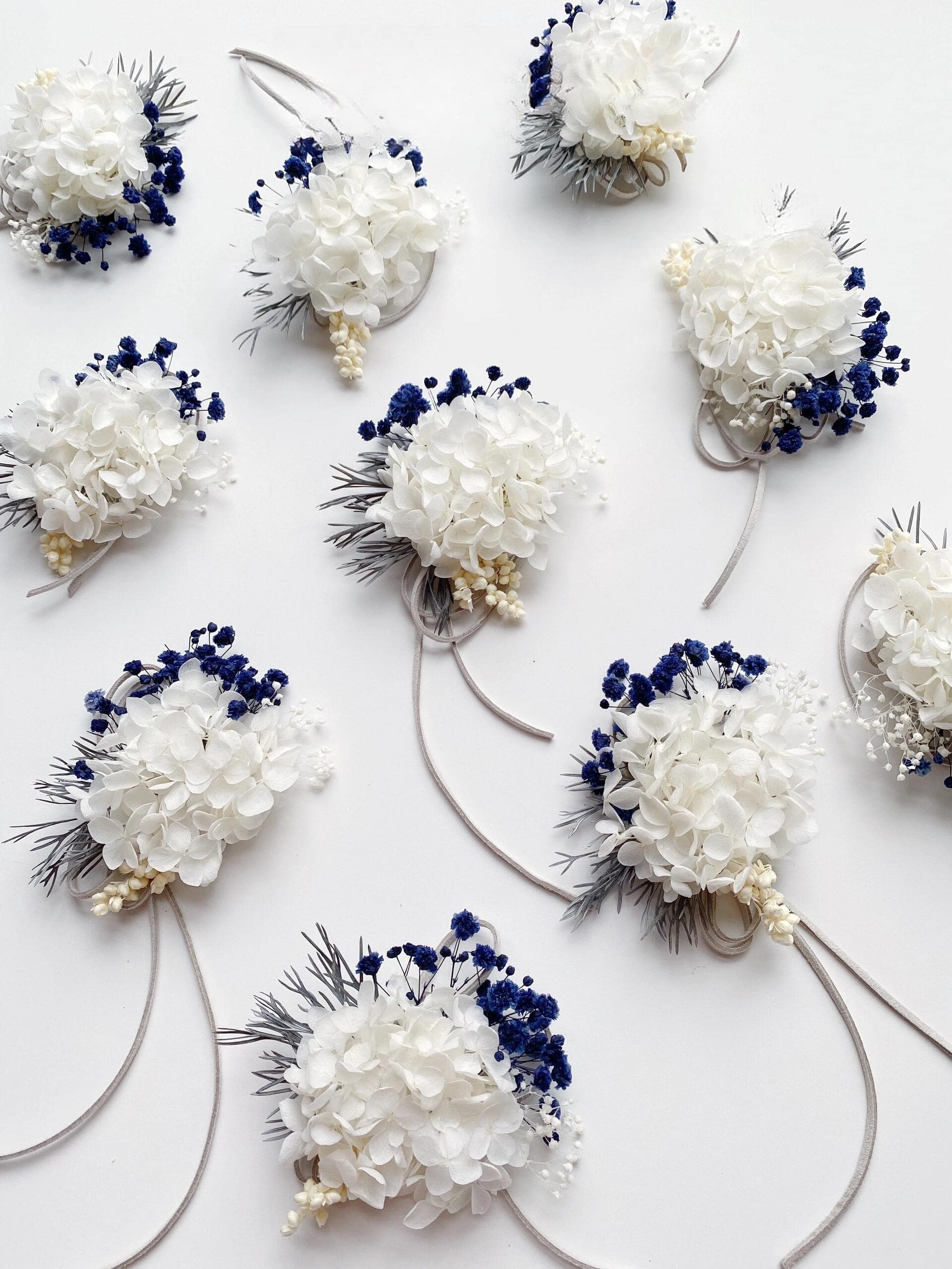 Wedding accessory with preserved hydrangeas and blue statice flowers
