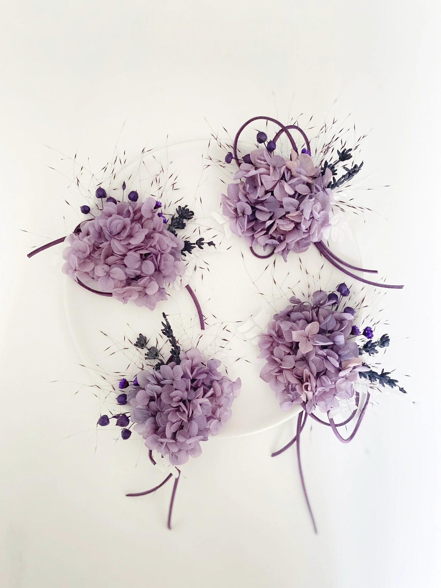 Purple hydrangea corsage with lavender accents, elegant floral accessory for weddings