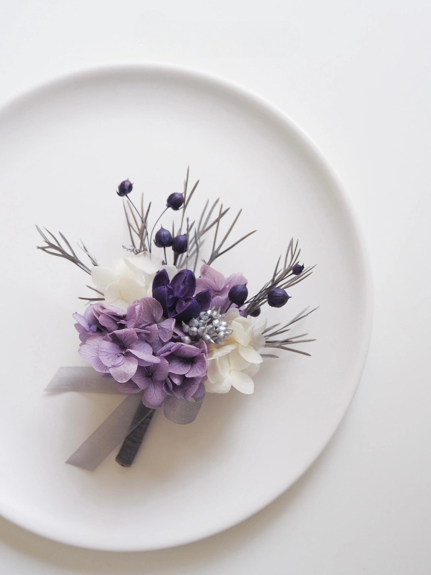 Lavender and White Hydrangea Boutonniere with Elegant Berry Accents