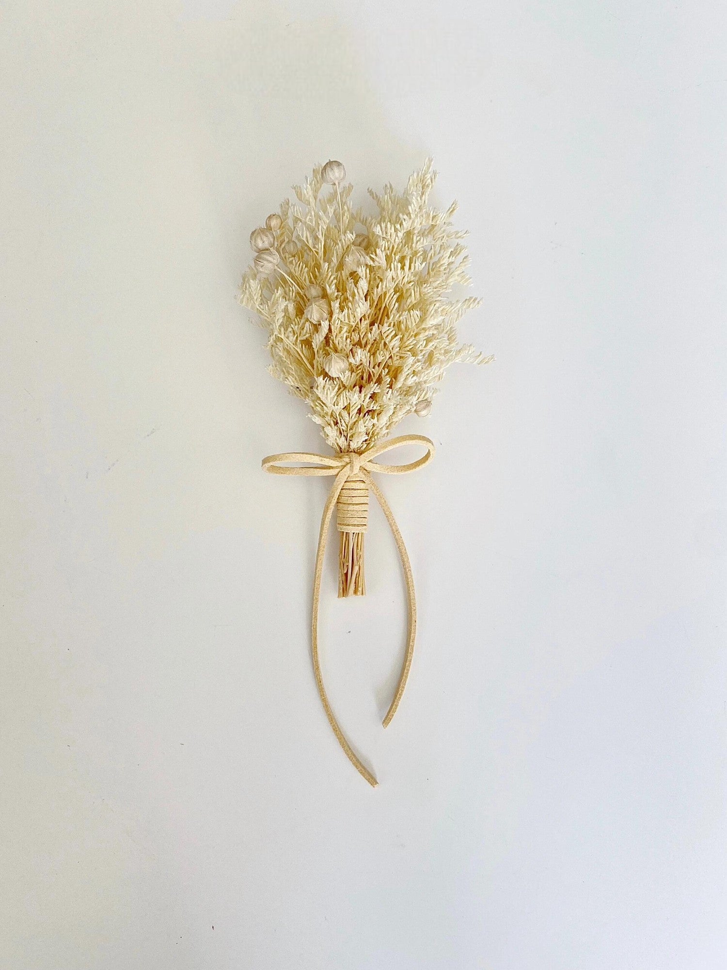 Rustic wedding boutonniere set with preserved dried flowers
