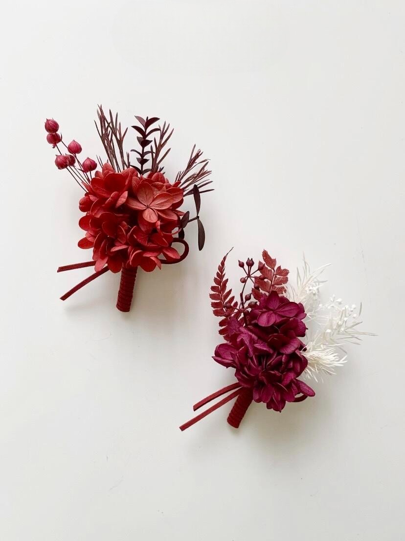 Terracotta and burgundy hydrangea boutonniere set with preserved flowers
