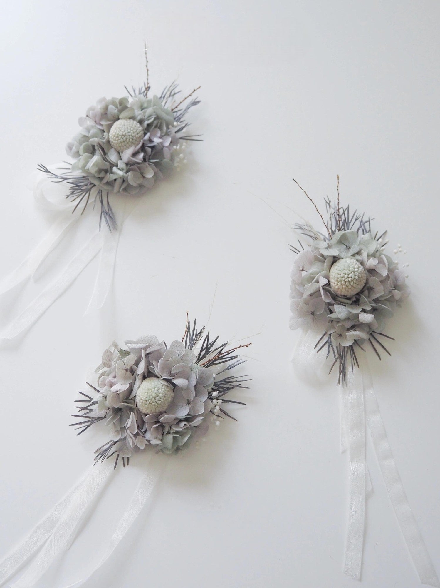 Real preserved flower corsage with craspedia and hydrangeas
