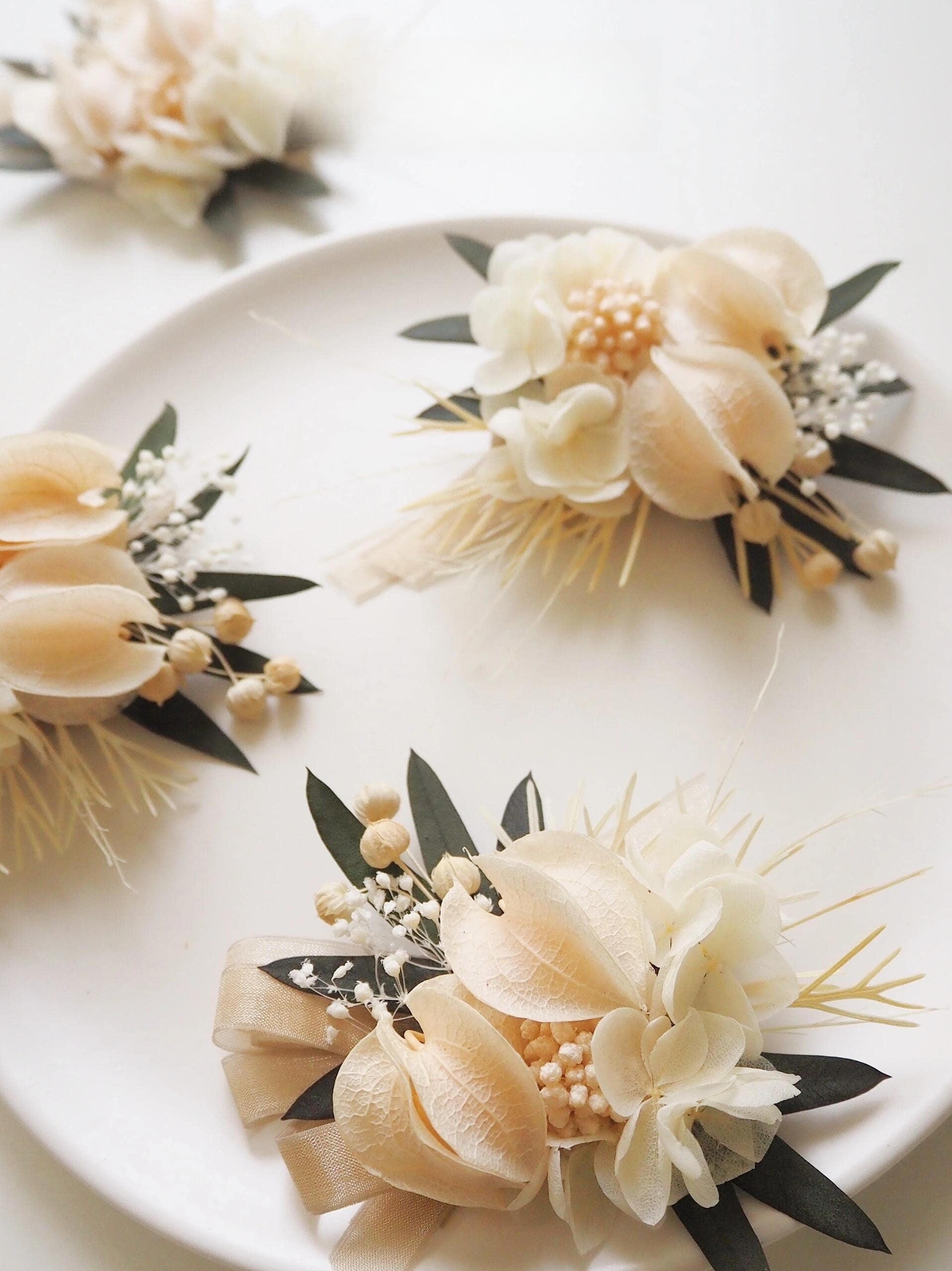 Preserved flower corsage featuring ivory calla lilies and hydrangeas
