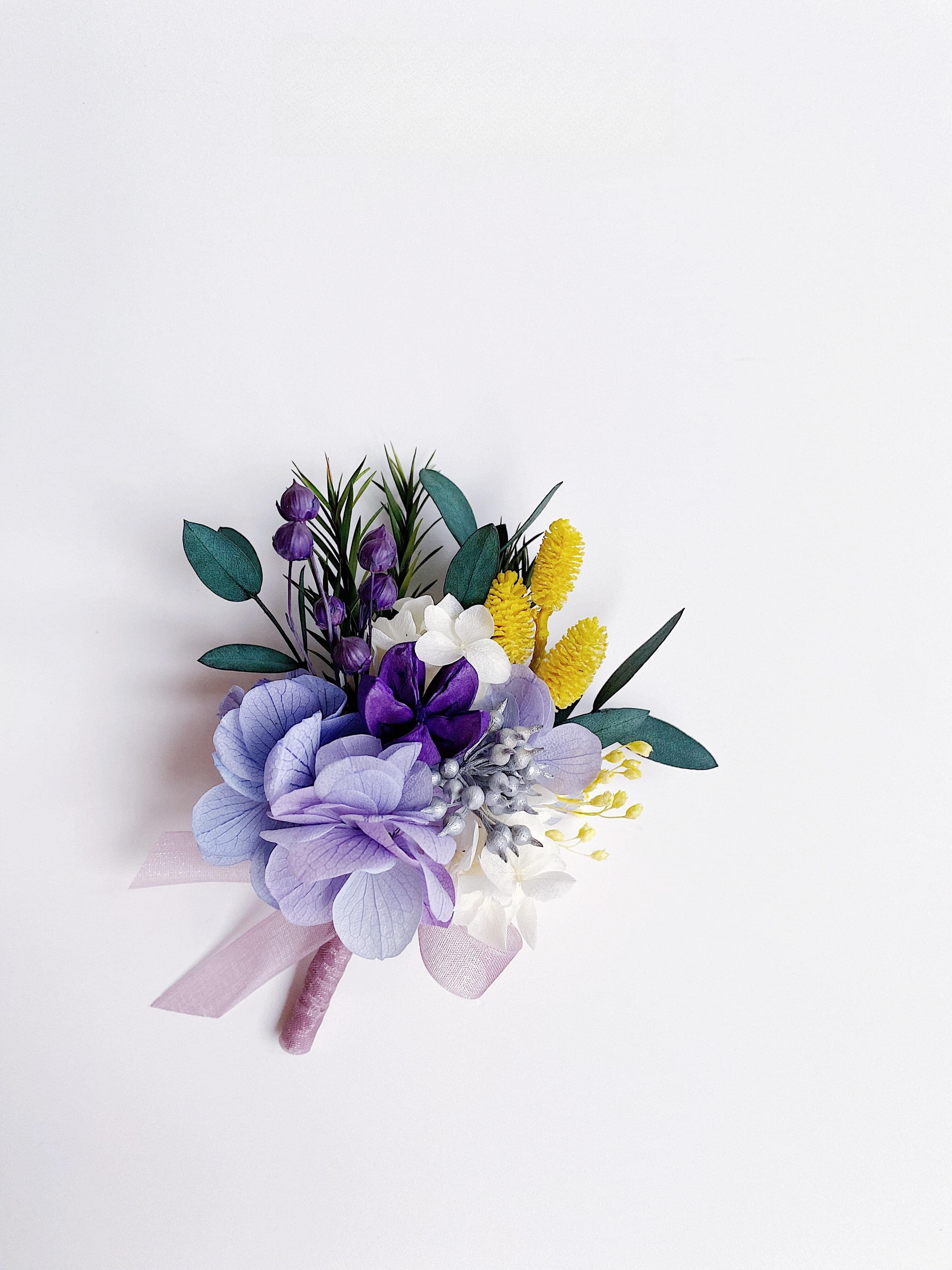 Real flower boutonniere with lavender hydrangea and freesia
