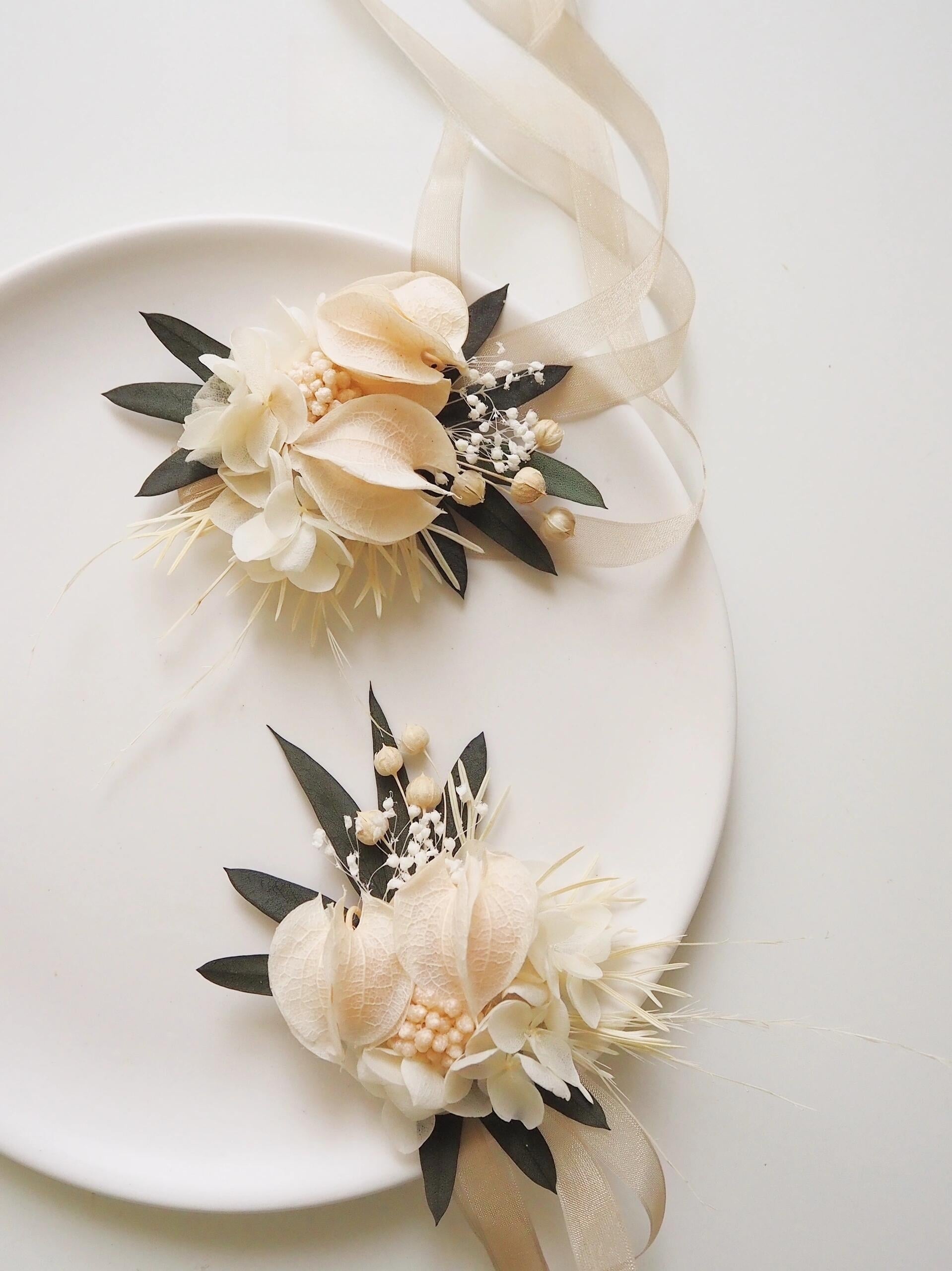 Elegant ivory calla lily and hydrangea wrist corsage for weddings
