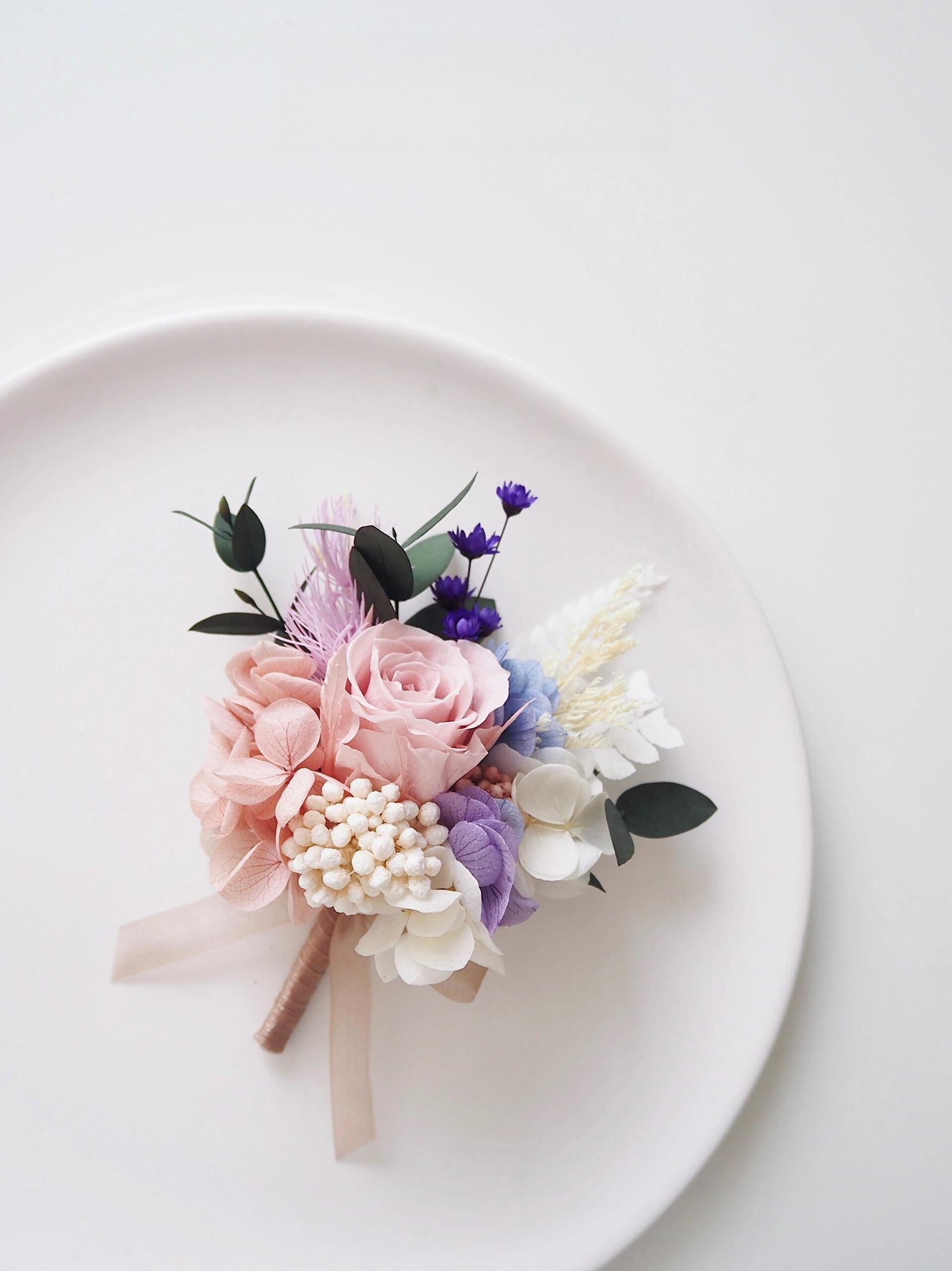 Blush rose and lilac hydrangea preserved boutonniere and corsage for weddings
