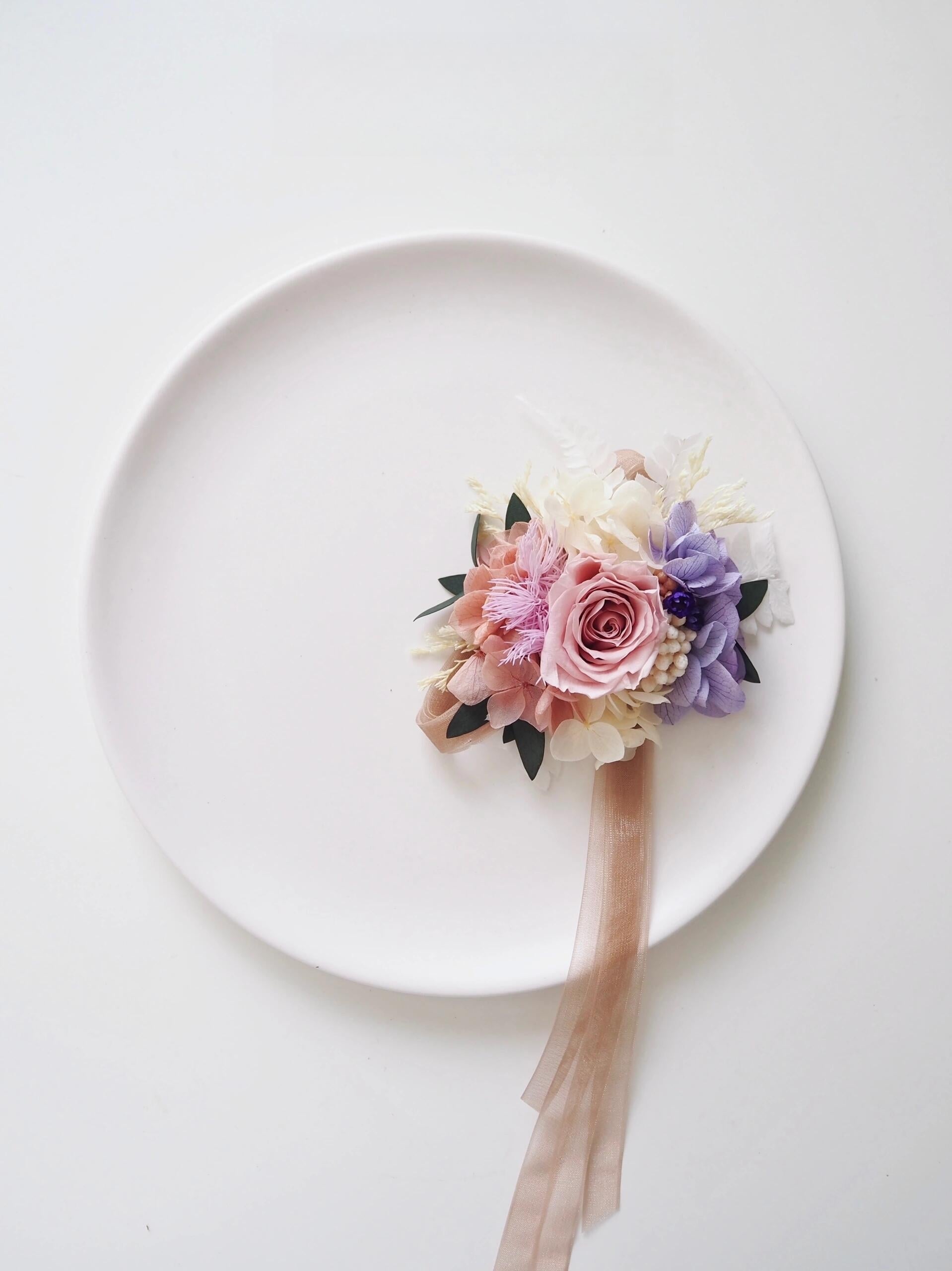 Blush rose and lilac hydrangea preserved boutonniere and corsage for weddings
